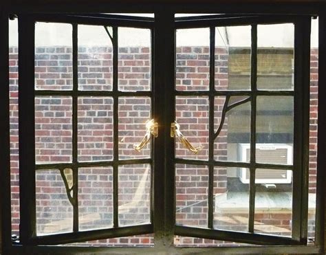 what are the metal window treatments on older houses called|metal windows for historic buildings.